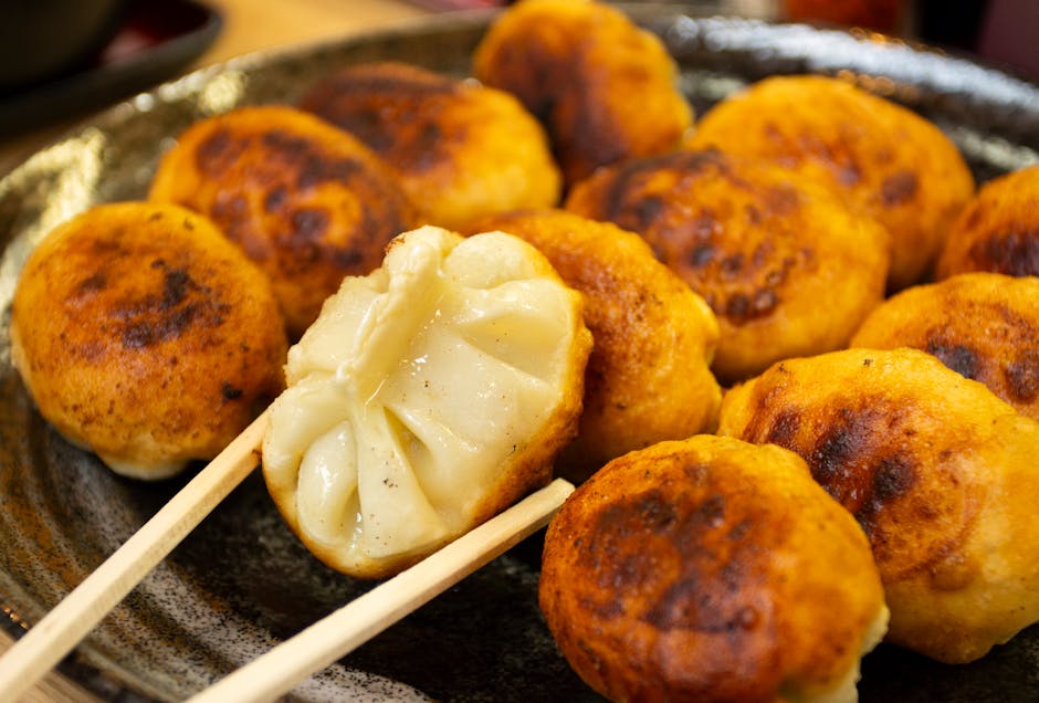 Close-up of golden Japanese dumplings in an authentic setting